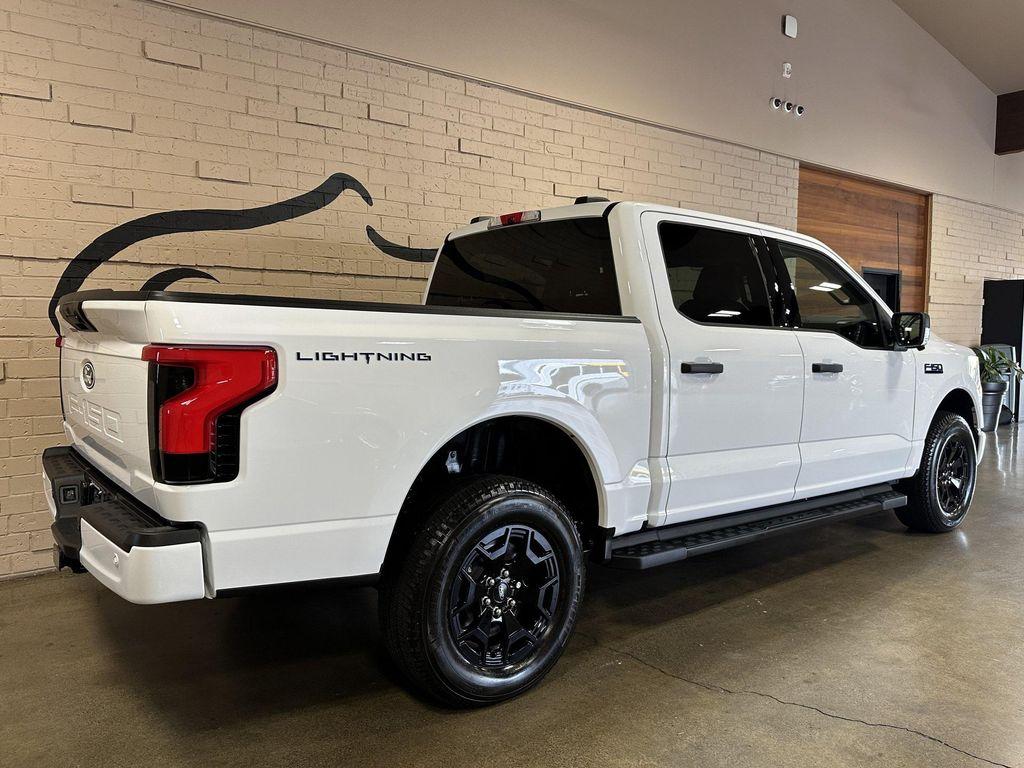 used 2025 Ford F-150 Lightning car, priced at $49,950