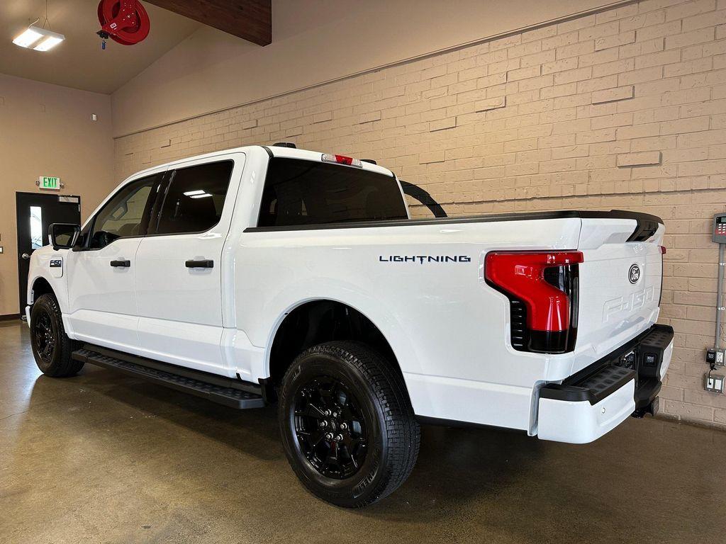 used 2025 Ford F-150 Lightning car, priced at $49,950