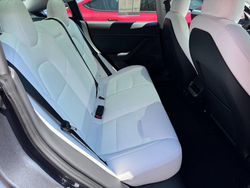 used 2022 Tesla Model 3 car, priced at $34,230
