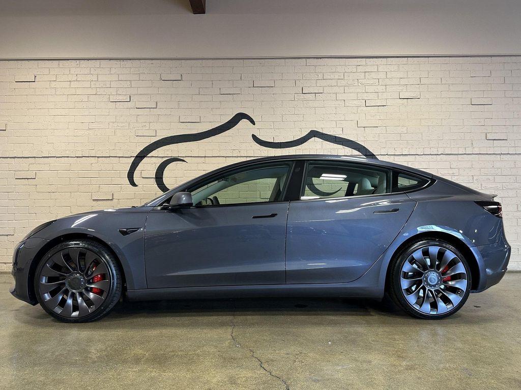 used 2022 Tesla Model 3 car, priced at $34,230