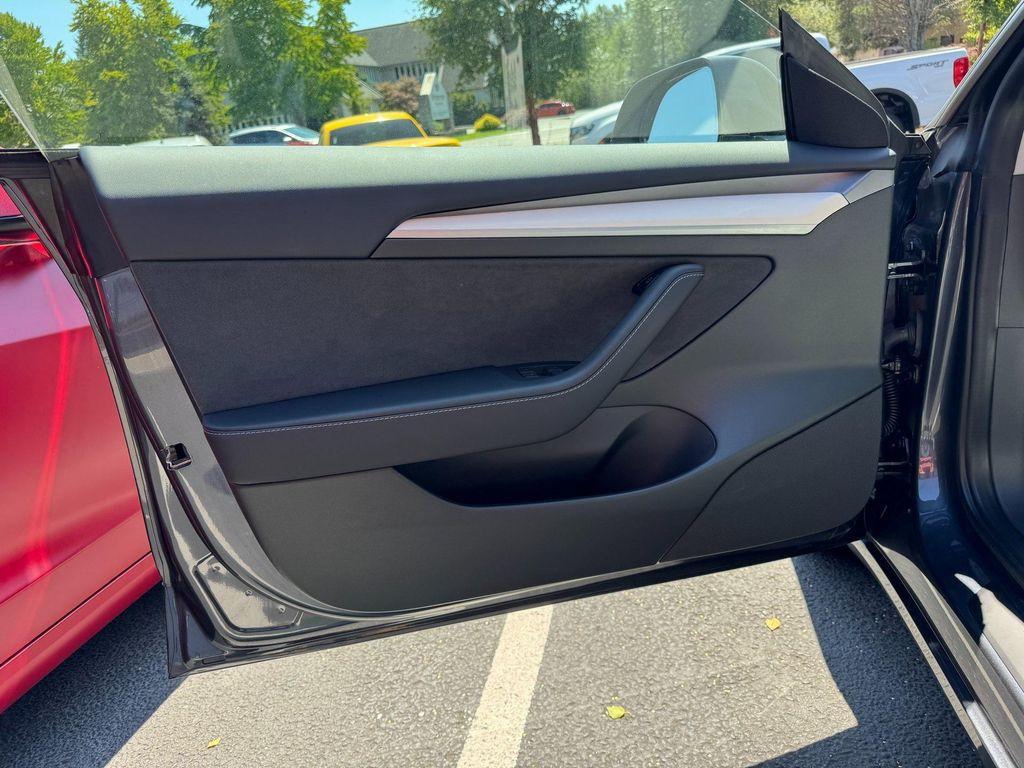 used 2022 Tesla Model 3 car, priced at $34,230