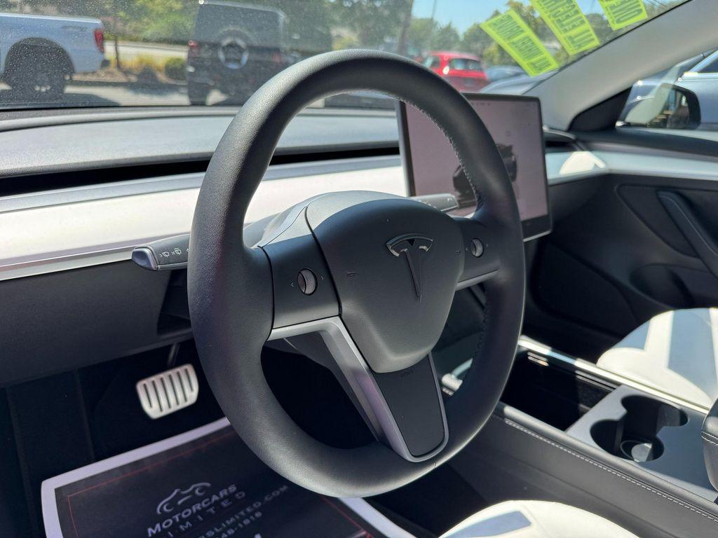 used 2022 Tesla Model 3 car, priced at $34,230