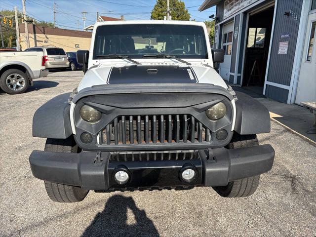 used 2015 Jeep Wrangler car, priced at $14,999