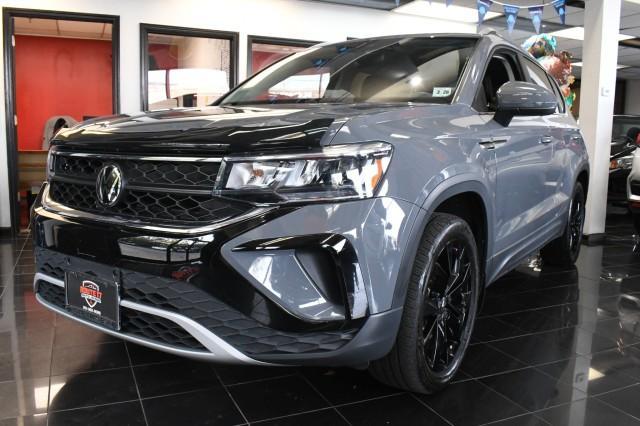 used 2023 Volkswagen Taos car, priced at $19,995