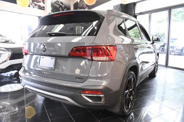 used 2023 Volkswagen Taos car, priced at $19,995