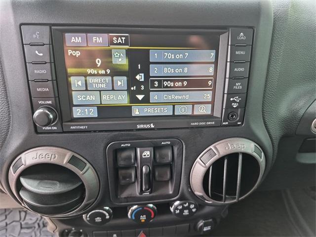used 2016 Jeep Wrangler Unlimited car, priced at $16,990