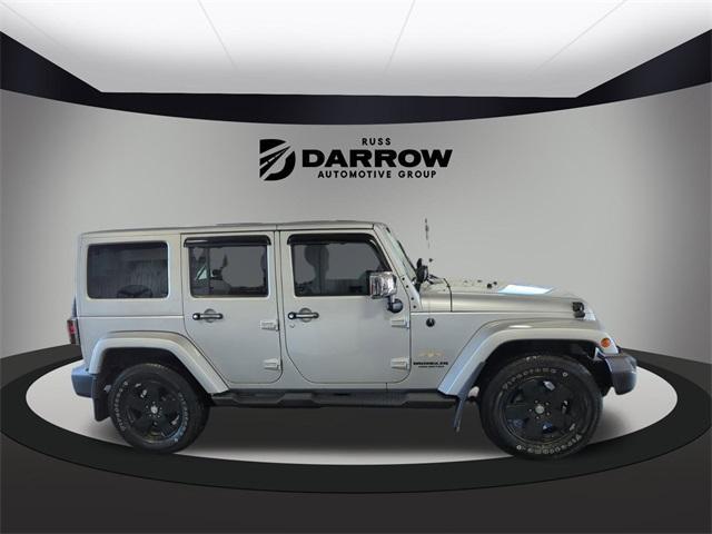 used 2012 Jeep Wrangler Unlimited car, priced at $13,950