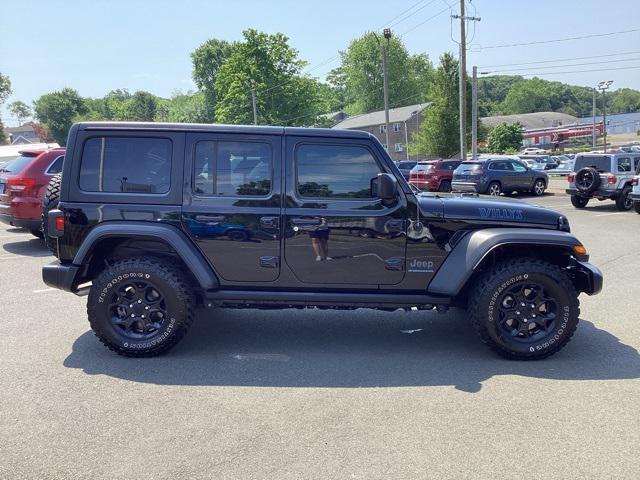 used 2023 Jeep Wrangler 4xe car, priced at $36,599