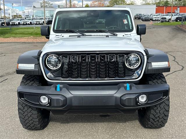 used 2024 Jeep Wrangler 4xe car, priced at $36,476