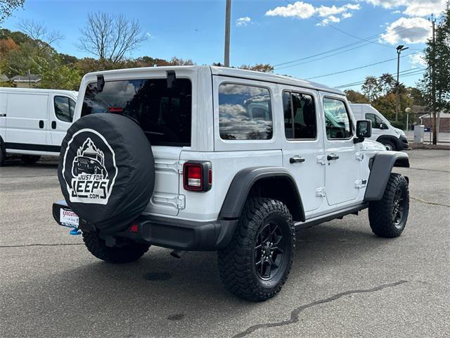 used 2024 Jeep Wrangler 4xe car, priced at $36,476
