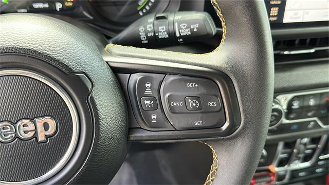 used 2024 Jeep Wrangler 4xe car, priced at $36,476