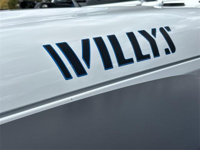 used 2024 Jeep Wrangler 4xe car, priced at $36,476