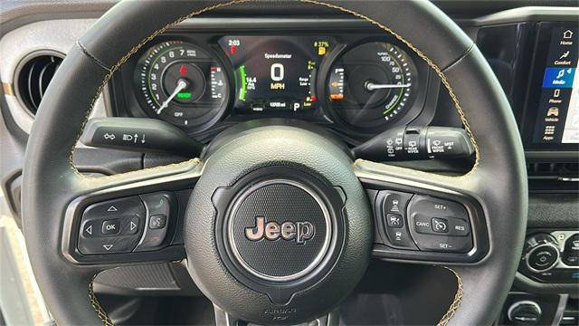used 2024 Jeep Wrangler 4xe car, priced at $36,476