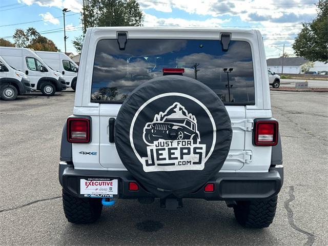 used 2024 Jeep Wrangler 4xe car, priced at $36,476