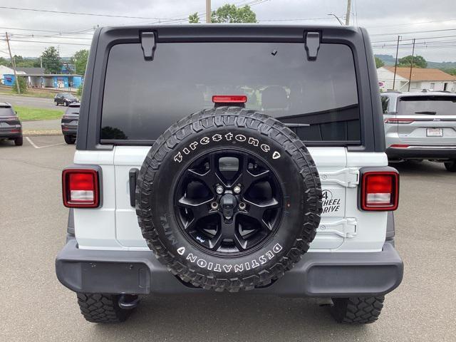used 2021 Jeep Wrangler car, priced at $34,286