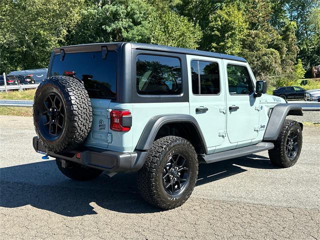 used 2024 Jeep Wrangler 4xe car, priced at $36,978