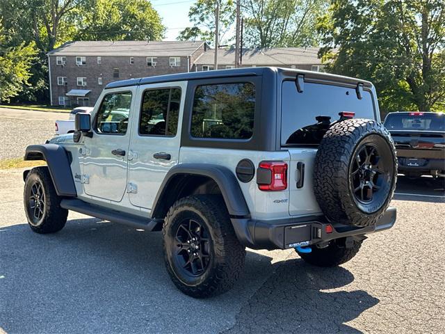used 2024 Jeep Wrangler 4xe car, priced at $36,978