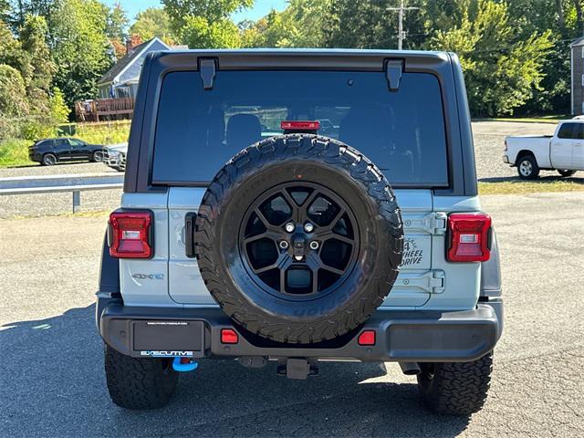 used 2024 Jeep Wrangler 4xe car, priced at $36,978
