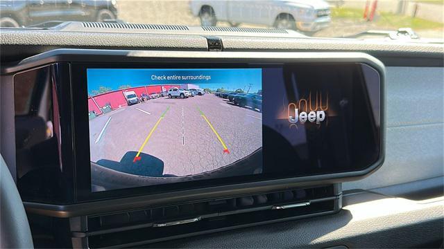 used 2024 Jeep Wrangler 4xe car, priced at $36,978