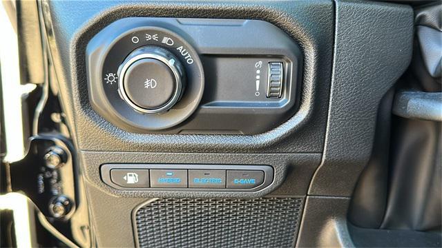 used 2024 Jeep Wrangler 4xe car, priced at $34,975