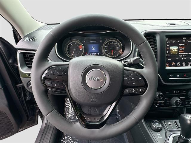 used 2023 Jeep Cherokee car, priced at $24,487