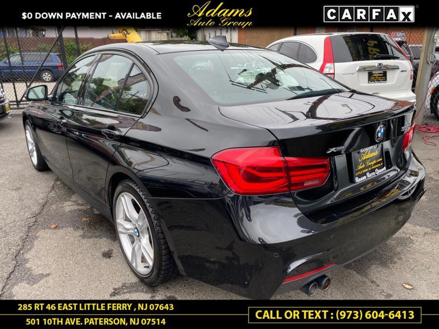 used 2018 BMW 330 car, priced at $14,136
