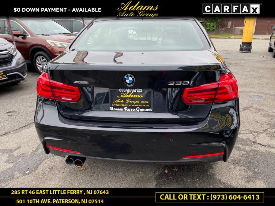 used 2018 BMW 330 car, priced at $14,136