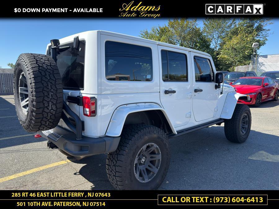 used 2014 Jeep Wrangler Unlimited car, priced at $20,789