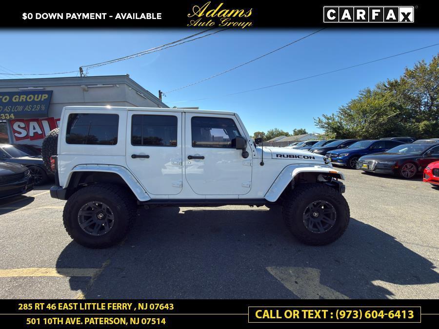 used 2014 Jeep Wrangler Unlimited car, priced at $20,789