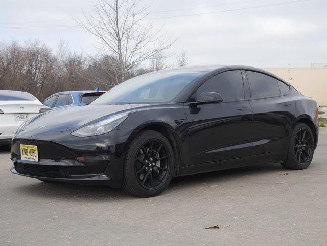 used 2023 Tesla Model 3 car, priced at $25,400