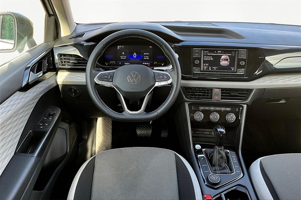 used 2023 Volkswagen Taos car, priced at $20,997