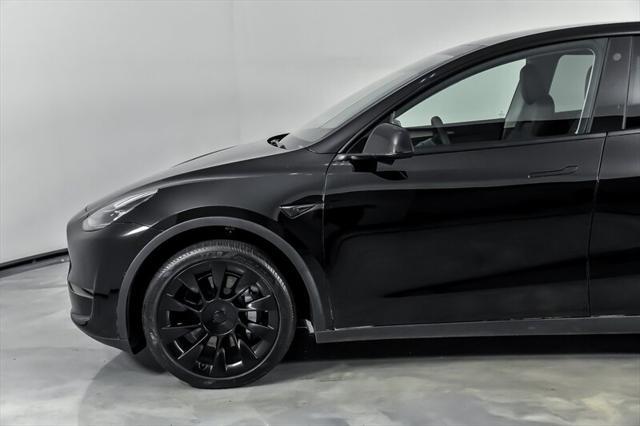 used 2023 Tesla Model Y car, priced at $30,995