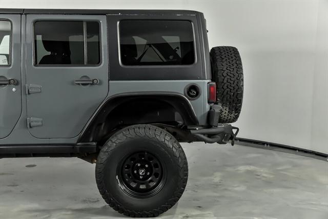 used 2014 Jeep Wrangler Unlimited car, priced at $23,995