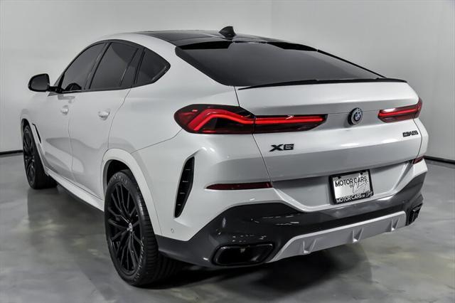 used 2022 BMW X6 car, priced at $57,995