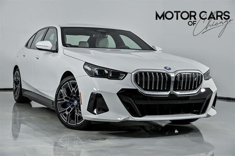 used 2025 BMW i5 car, priced at $57,995