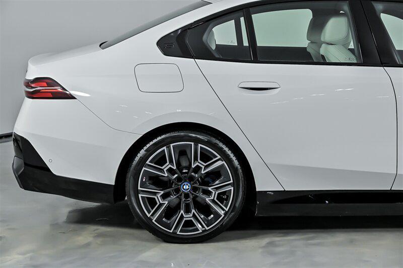 used 2025 BMW i5 car, priced at $57,995