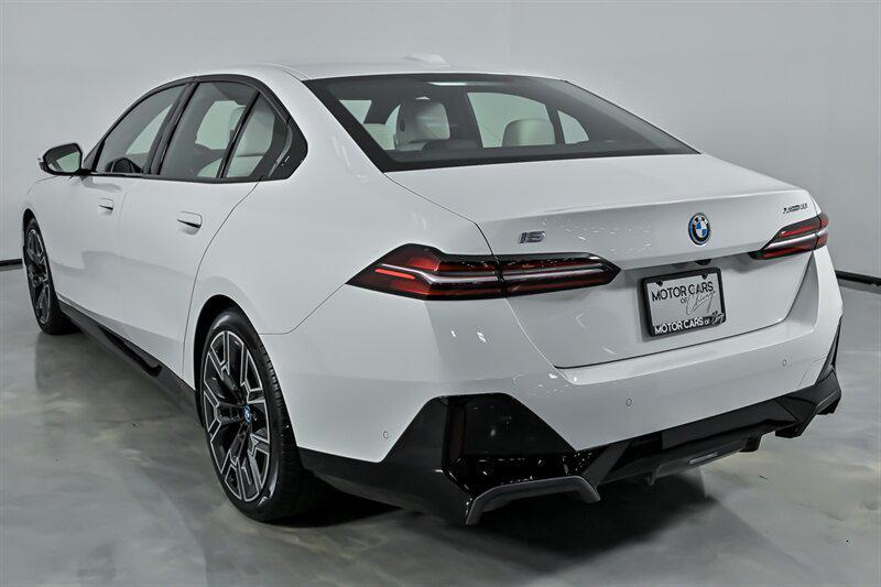 used 2025 BMW i5 car, priced at $57,995