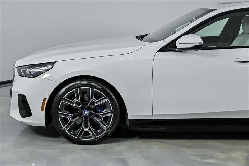 used 2025 BMW i5 car, priced at $57,995