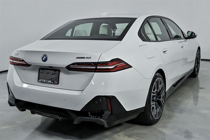 used 2025 BMW i5 car, priced at $57,995