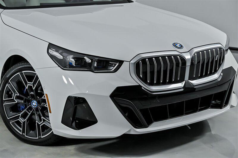 used 2025 BMW i5 car, priced at $57,995