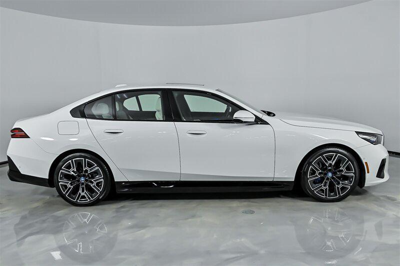 used 2025 BMW i5 car, priced at $57,995