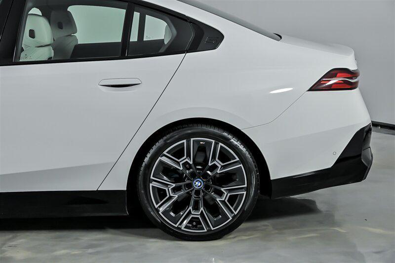 used 2025 BMW i5 car, priced at $57,995