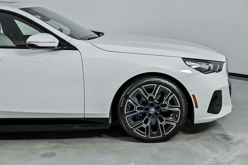 used 2025 BMW i5 car, priced at $57,995