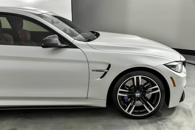 used 2018 BMW M4 car, priced at $43,995