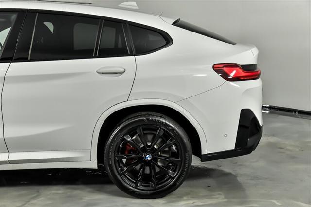 used 2024 BMW X4 car, priced at $63,995