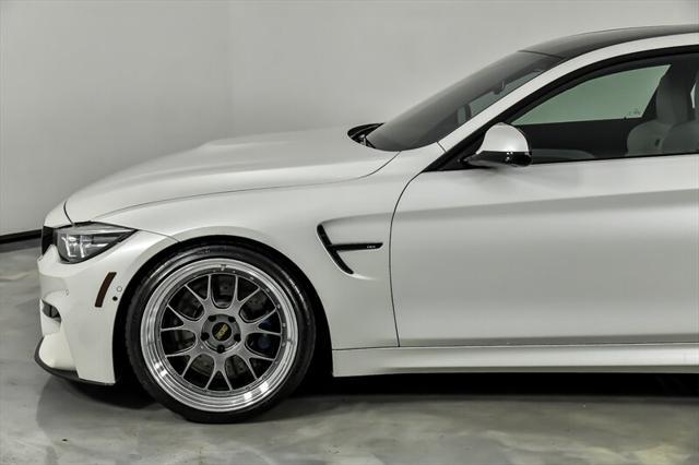 used 2019 BMW M4 car, priced at $42,995