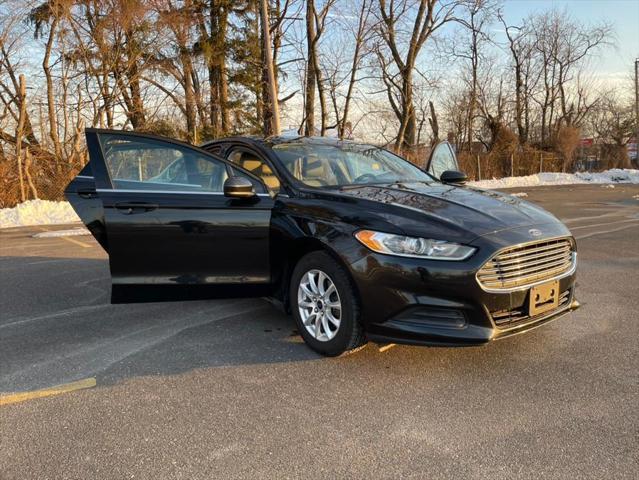 used 2015 Ford Fusion car, priced at $8,495