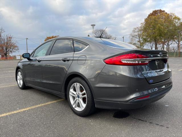 used 2018 Ford Fusion car, priced at $10,995