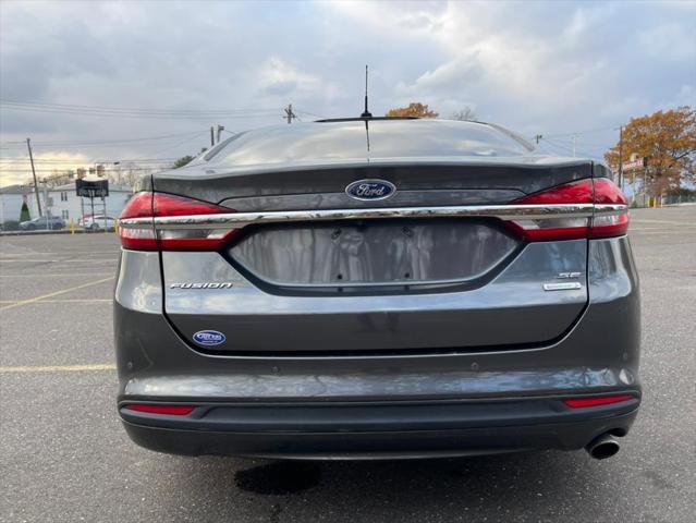 used 2018 Ford Fusion car, priced at $9,995