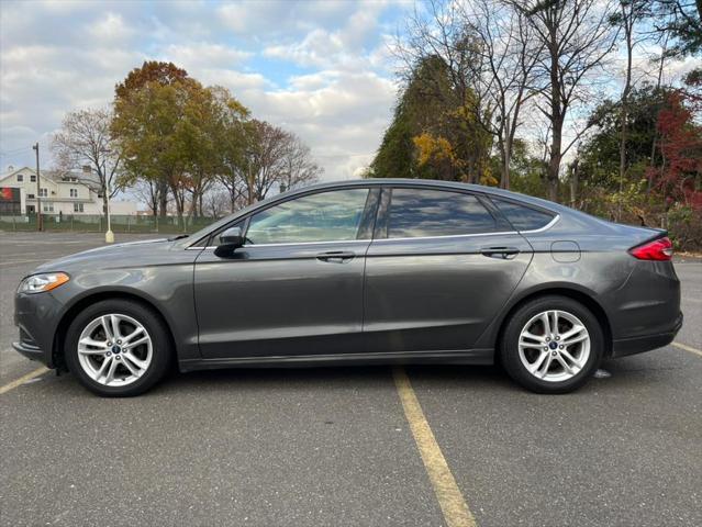 used 2018 Ford Fusion car, priced at $10,995